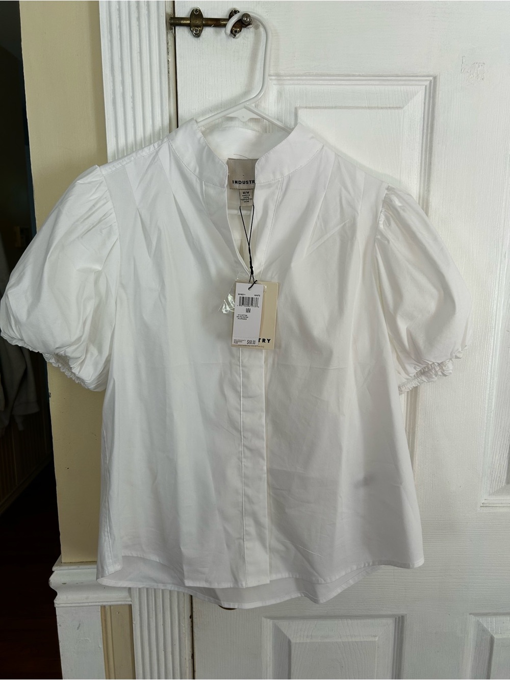 NWT INDUSTRY white puff sleeve peplum top.